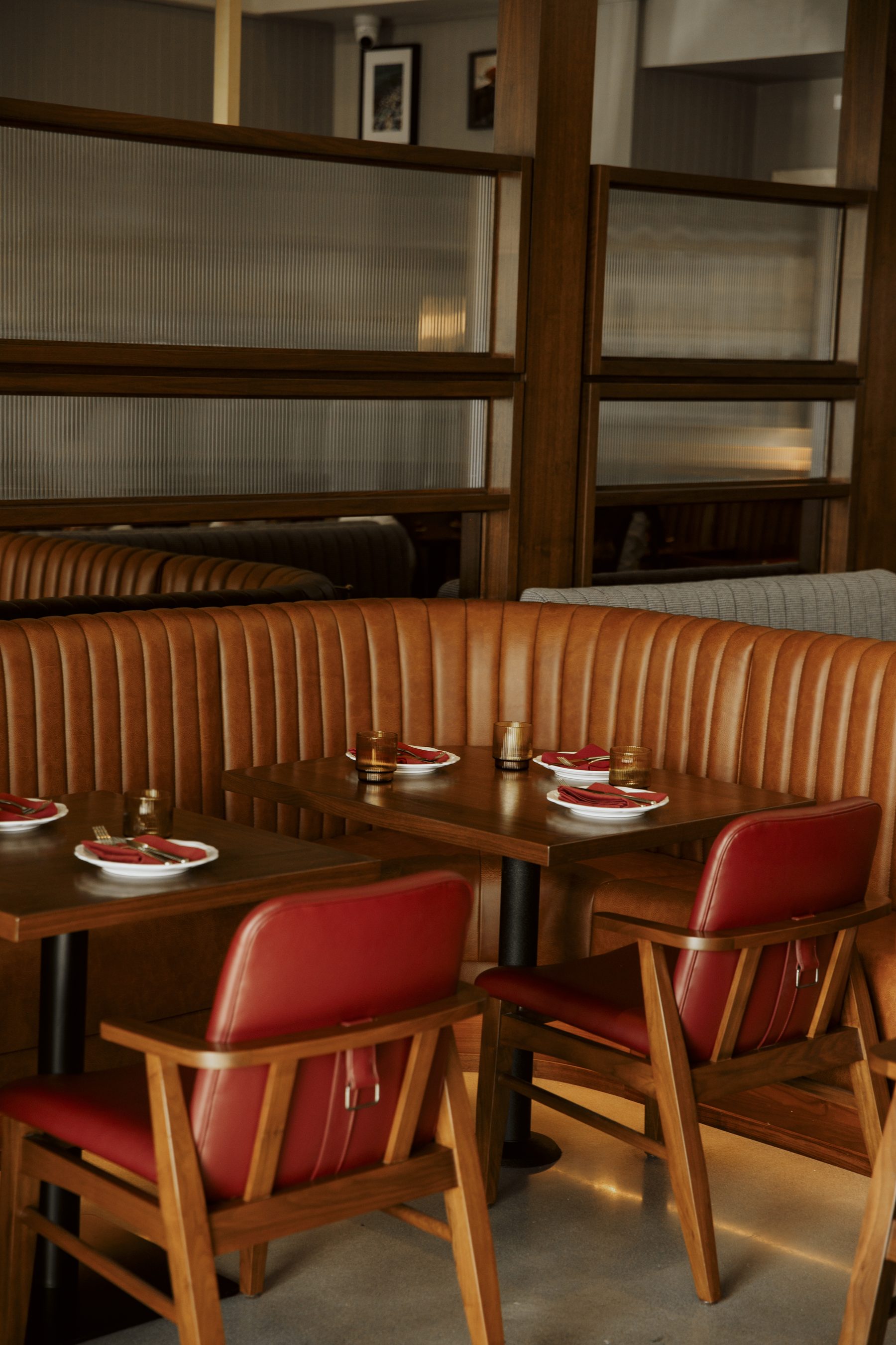 Salina's dining room — cognac booths and red leather chairs